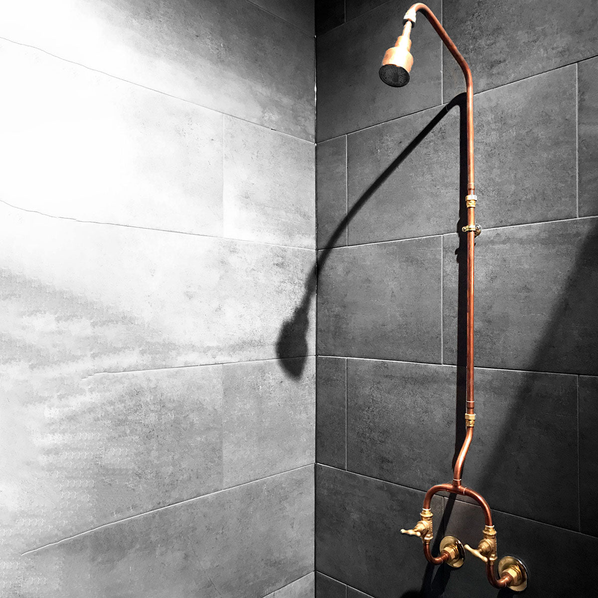 Copper shower for industrial style bathroom by Switchrange