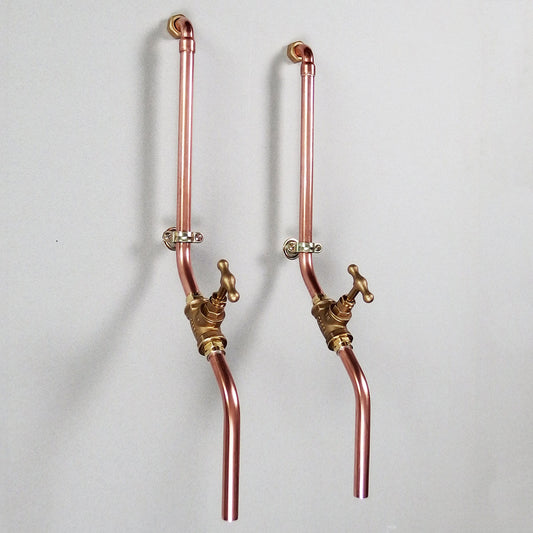 Pair of wall mounted taps made by hand in pure unlacquered copper and brass - by Switchrange
