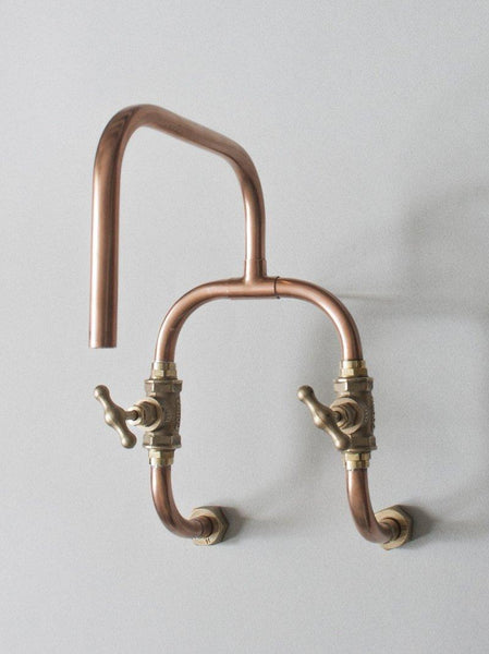 Loop is a  wall mount industrial look handmade solid copper pipe faucet. robinet cuivre