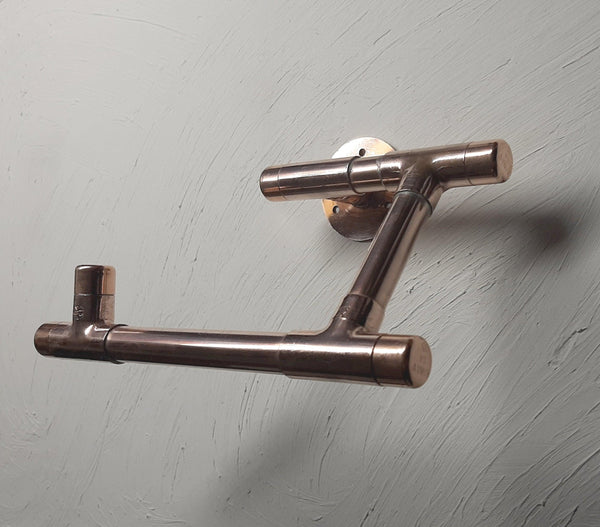 handmade support for toilet paper made of copper pipe